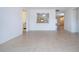 Dining room with tile floors and kitchen pass-through at 1613 Faxton Dr, Sun City Center, FL 33573