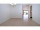Bright dining room with tile floors and chandelier at 1613 Faxton Dr, Sun City Center, FL 33573
