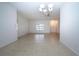 Bright dining room with tile floors and chandelier at 1613 Faxton Dr, Sun City Center, FL 33573