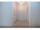 Simple entryway with tiled floor and storage at 1613 Faxton Dr, Sun City Center, FL 33573