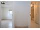 Hallway connecting bedroom and bathroom at 1613 Faxton Dr, Sun City Center, FL 33573