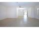 Bright living room with tile floors and access to a patio at 1613 Faxton Dr, Sun City Center, FL 33573