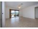 Spacious living room with sliding doors to patio at 1613 Faxton Dr, Sun City Center, FL 33573