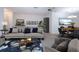 Spacious living room with staged furniture and stylish decor at 1613 Faxton Dr, Sun City Center, FL 33573