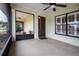 Relaxing screened porch with ceiling fan and view at 1613 Faxton Dr, Sun City Center, FL 33573