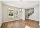 Spacious dining area with hardwood floors and chandelier at 1742 W Saint Louis St, Tampa, FL 33607