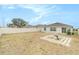 Large backyard with fire pit and fenced area at 1782 Broad Winged Hawk Dr, Ruskin, FL 33570