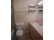 Clean bathroom, featuring a vanity with drawers and shelves at 1820 Bough Ave # 3, Clearwater, FL 33760