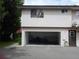 Attached garage with extra storage space at 1820 Bough Ave # 3, Clearwater, FL 33760