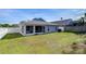 House with screened porch and fenced backyard at 19304 Garden Quilt Cir, Lutz, FL 33558