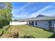 House with screened porch and fenced backyard at 19304 Garden Quilt Cir, Lutz, FL 33558