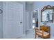 Bathroom with granite vanity, white toilet, and shower/tub combo at 19304 Garden Quilt Cir, Lutz, FL 33558