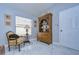 Elegant dining area with antique furniture and large windows at 19304 Garden Quilt Cir, Lutz, FL 33558
