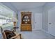 Formal dining area featuring an antique cabinet and chair at 19304 Garden Quilt Cir, Lutz, FL 33558