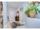 Bright foyer with marble floors and decorative accents at 19304 Garden Quilt Cir, Lutz, FL 33558