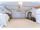 Garage with space for two cars and storage at 19304 Garden Quilt Cir, Lutz, FL 33558