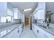 Modern kitchen with white cabinets and granite countertops at 19304 Garden Quilt Cir, Lutz, FL 33558