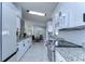 Updated kitchen featuring stainless steel appliances and granite countertops at 19304 Garden Quilt Cir, Lutz, FL 33558