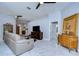 Relaxing living room, featuring hardwood floors and lots of natural light at 19304 Garden Quilt Cir, Lutz, FL 33558