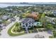 Luxury home with pool, waterfront view, and lush landscaping at 200 Cordova Ne Blvd, St Petersburg, FL 33704
