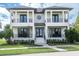 Stunning two-story home with white exterior and black accents at 200 Cordova Ne Blvd, St Petersburg, FL 33704
