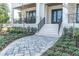 Elegant front entry with stone steps and landscaping at 200 Cordova Ne Blvd, St Petersburg, FL 33704