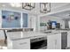 Modern kitchen with marble countertops and stainless steel appliances at 200 Cordova Ne Blvd, St Petersburg, FL 33704