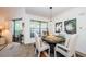 Cozy dining area with a round table and four chairs at 204 Lennox W Rd, Palm Harbor, FL 34683