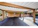 Covered carport parking with additional storage space at 204 Lennox W Rd, Palm Harbor, FL 34683