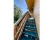 Exterior stairs leading to condo building entrance at 204 Lennox W Rd, Palm Harbor, FL 34683