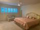 Spacious bedroom with a king-size bed and a sitting area at 2285 Israeli Dr # 1, Clearwater, FL 33763