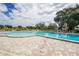 Relaxing community pool with a spacious deck at 2285 Israeli Dr # 1, Clearwater, FL 33763