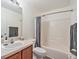 Clean bathroom with a tub, toilet and single vanity at 2397 Ainsworth Ave, Spring Hill, FL 34609