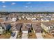 Aerial view of a residential neighborhood with houses and yards at 333 Argyll Dr, Spring Hill, FL 34609