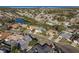 Aerial view showcasing a house and surrounding neighborhood near the coast at 3457 Foxhall Dr, Holiday, FL 34691