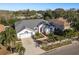Single-Gathering home with a two-car garage and lush landscaping at 3457 Foxhall Dr, Holiday, FL 34691