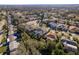 Aerial view of neighborhood with water at 3457 Foxhall Dr, Holiday, FL 34691