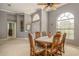 Dining room with wood table and chairs, near entryway at 3457 Foxhall Dr, Holiday, FL 34691