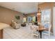 Casual dining area with white and blue chairs at 3457 Foxhall Dr, Holiday, FL 34691