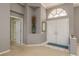 Bright entryway with double doors and high ceilings at 3457 Foxhall Dr, Holiday, FL 34691