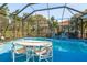 Enjoy this refreshing pool with a view from the patio at 3457 Foxhall Dr, Holiday, FL 34691