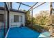 Spacious screened patio with room for relaxing and gardening at 3457 Foxhall Dr, Holiday, FL 34691