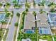 Aerial view of two houses with pools and lush landscaping at 5230 Admiral Pointe Dr, Apollo Beach, FL 33572