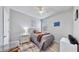 Cozy bedroom with ample closet space and ceiling fan at 5230 Admiral Pointe Dr, Apollo Beach, FL 33572