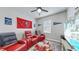 Fun game room with reclining chairs and large TV at 5230 Admiral Pointe Dr, Apollo Beach, FL 33572