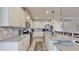 Modern kitchen with stainless steel appliances and an island at 5230 Admiral Pointe Dr, Apollo Beach, FL 33572