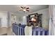Spacious living room with sectional sofa, hardwood floors, and entertainment center at 5230 Admiral Pointe Dr, Apollo Beach, FL 33572