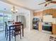 Kitchen with stainless steel appliances, view to dining area at 5820 24Th S Ave, Gulfport, FL 33707