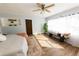 Bedroom with large windows, king bed, and window seat at 6554 34Th N Ave, St Petersburg, FL 33710