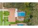 Aerial view showing home, pool, and surrounding neighborhood at 6774 Treehaven Dr, Spring Hill, FL 34606